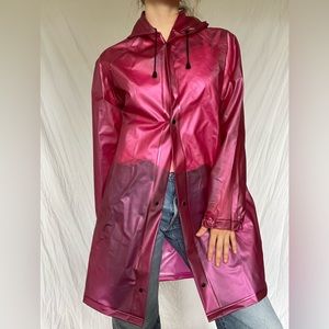 Pink sparkly translucent rain jacket